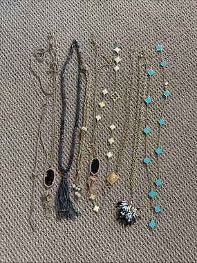 Lot of 8 costume jewelry necklaces. Assorted brands.